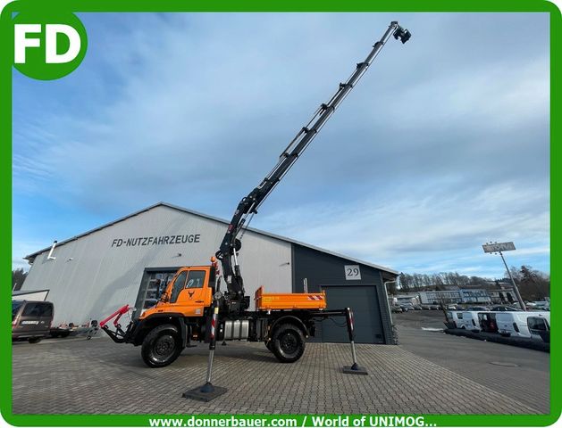 Unimog U500 mit 21.6 Meter Mega Kran