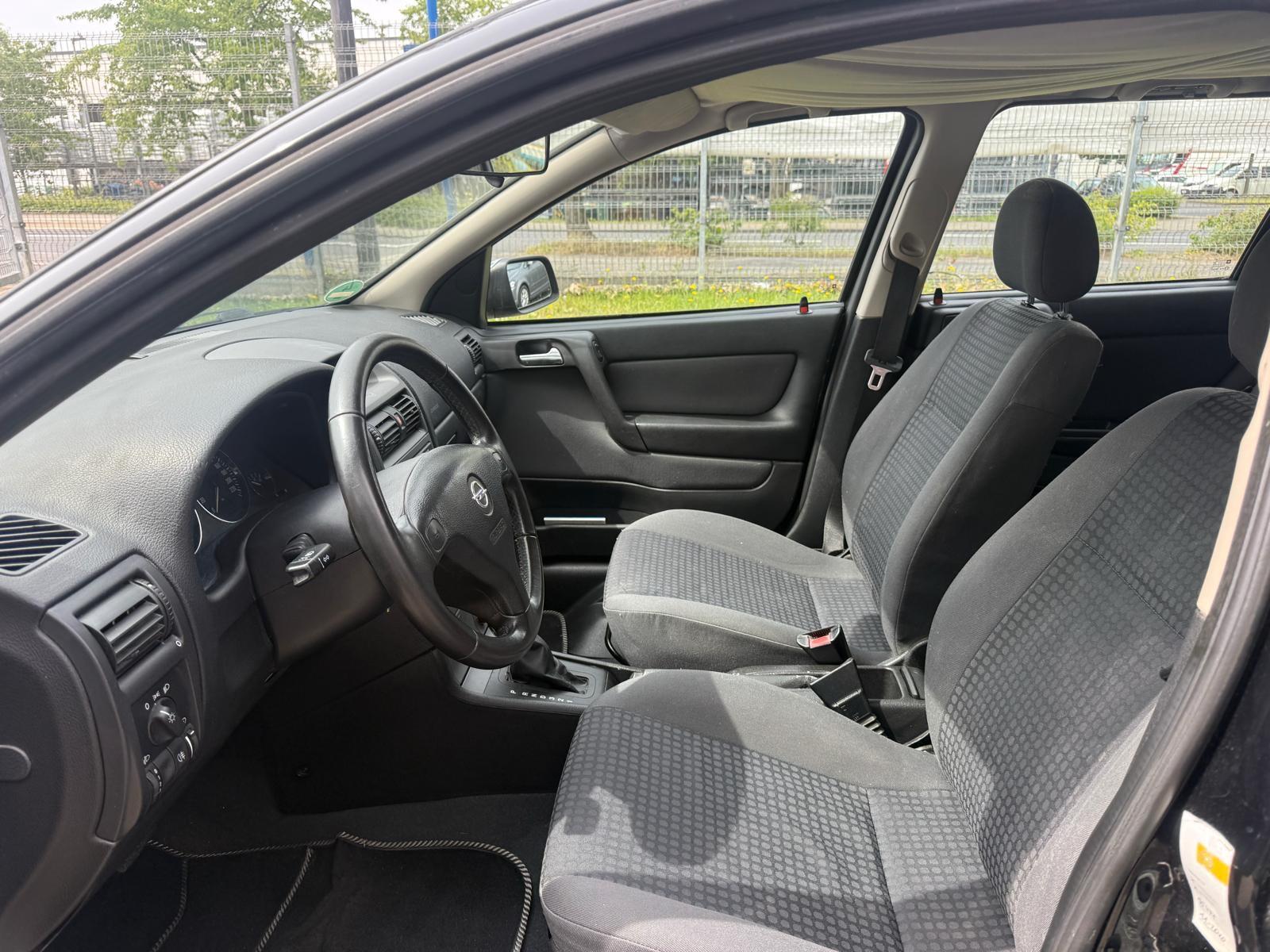 Opel Astra 2004 — photo 8