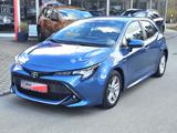 Toyota Corolla Hybrid - Toyota Corolla: Blau, Limousine