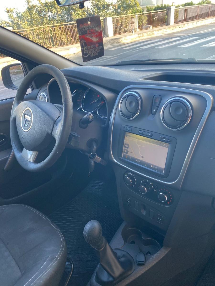 Dacia Logan 2014 — photo 13
