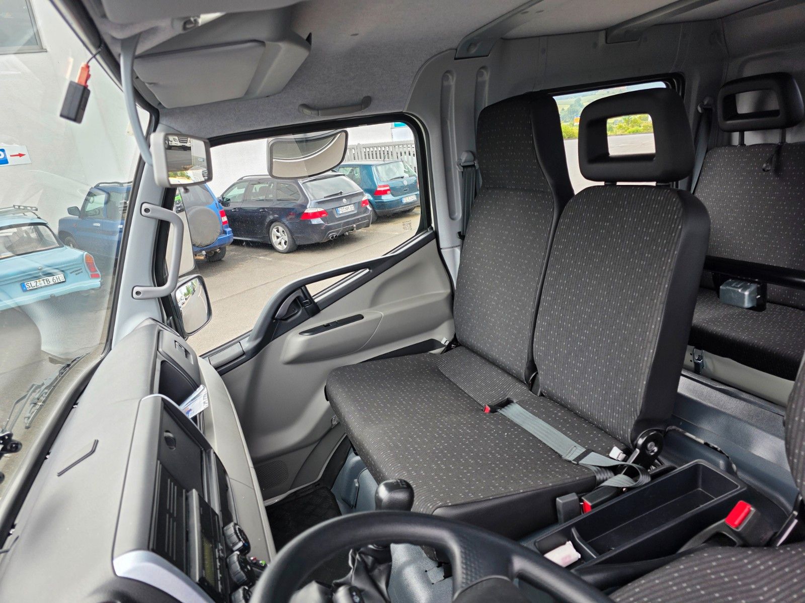 Fahrzeugabbildung Mitsubishi Fuso Canter 6C18D DoKa 4x4 Kran Atlas 65.2 - A2