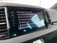 Skoda Karoq 1.5 TSI DSG Sportline PANO KAM AHK 4JGAR bei Autohaus Landmann & Maier OHG