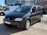 Volkswagen Touran Highline, 1,6, Leder, 6Gang - Volkswagen Touran aus 2005: Highline
