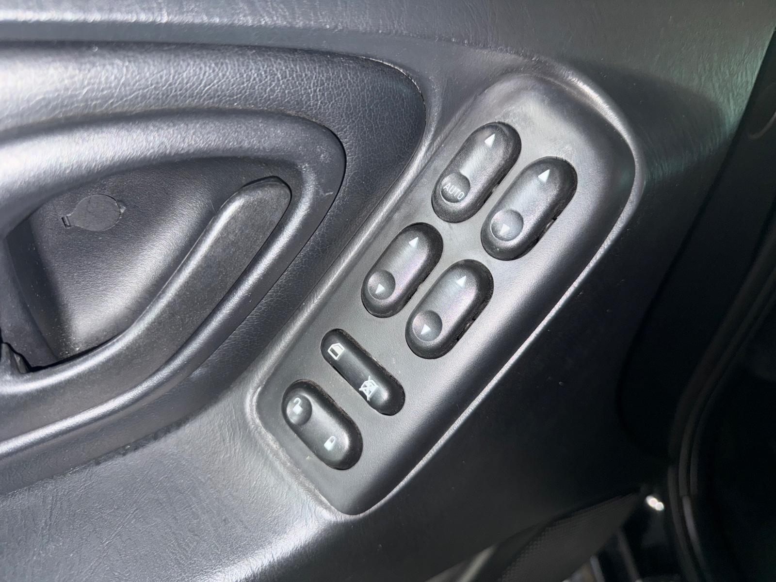 Ford Maverick 2006 — photo 17