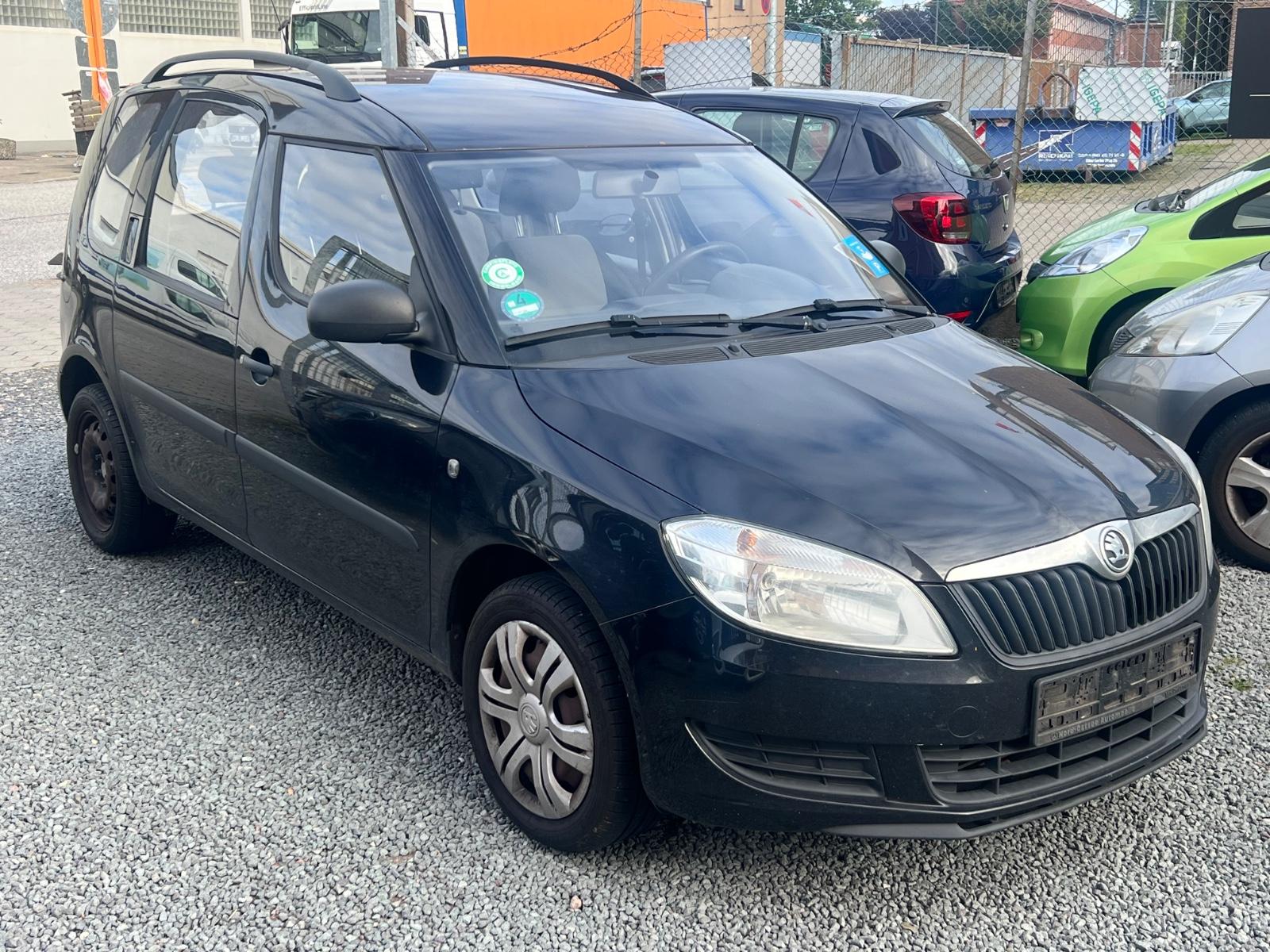 Skoda Roomster 2013 — вигляд ззаду
