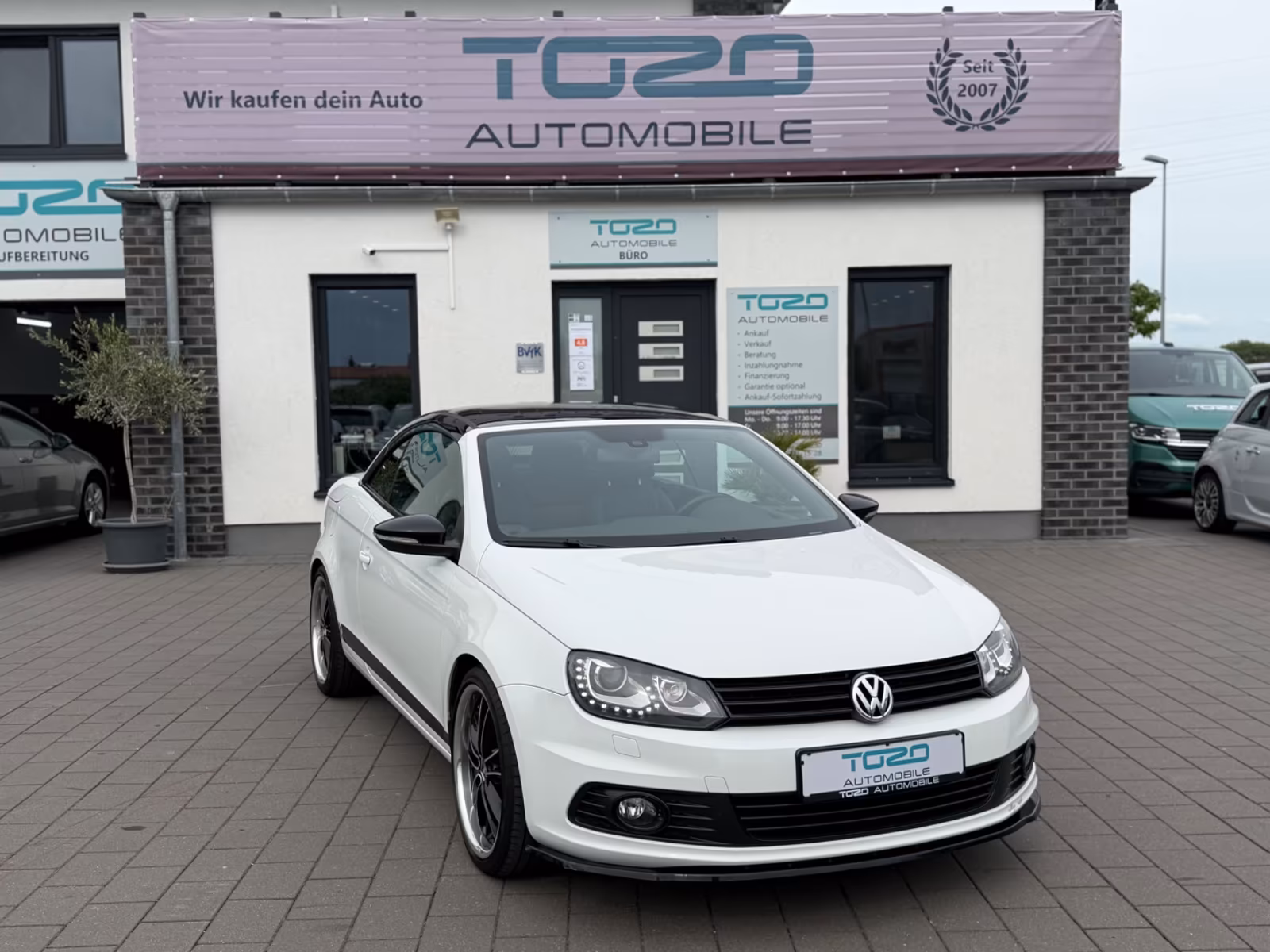 Volkswagen Eos 2.0 Sport&Style *NAVI*KAMERA*LEDER*AHK*PANO*