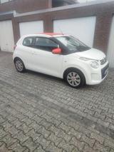 Citroën Citroen C1 mit rotem elektrischen Faltdach  - : Kleinwagen, Faltdach mit