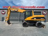 CAT M318C - CAT Mobilbagger 318