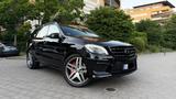Mercedes-Benz ML 63 AMG V8 Biturbo/Sport/SHD/AHK/HK/22" - schwarze Mercedes-Benz ML 63 AMG