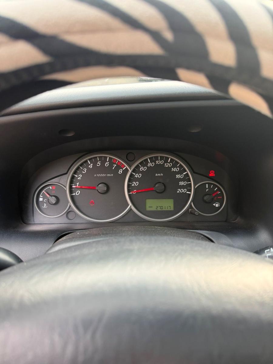 Mazda Tribute 2004 — photo 12