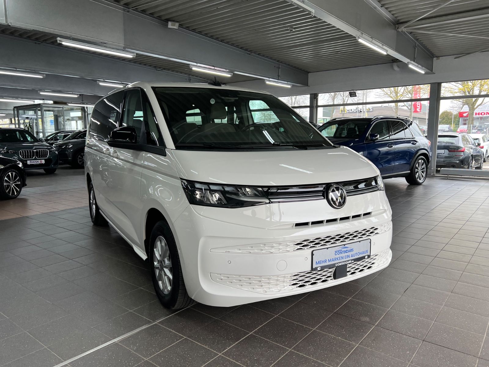 Volkswagen T7 Multivan 2.0 TDI Life Lang Easy Open+ACCCar2X imagem 3