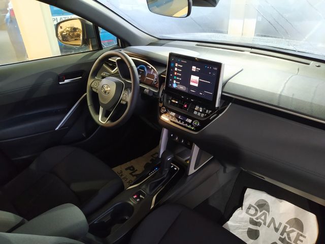 Toyota Corolla Cross Hybrid TEAM-D Panora Grau Automatik