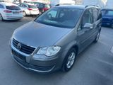 Volkswagen Touran 1.6 United*7-Sitzer*NAVI*AHK*Tempomat* - Volkswagen Touran aus 2009: United