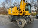 Komatsu PW180-10 Mobilbagger OilQuick Löffel - Komatsu Kettenbagger