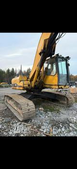 CAT 320 BL material handler  with liftable cabin - CAT 320
