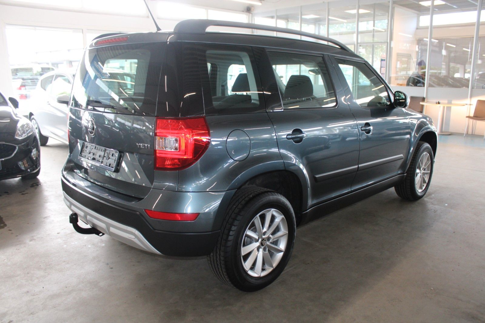 Fahrzeugabbildung SKODA Yeti 1.4 TSI Green tec Ambition Outdoor AHK 1.Hd
