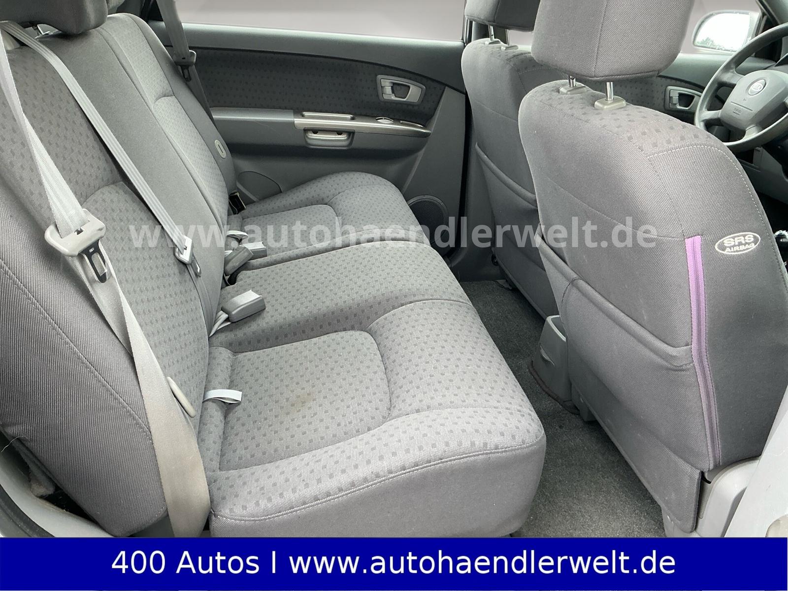 Kia Carens 2005 — photo 12