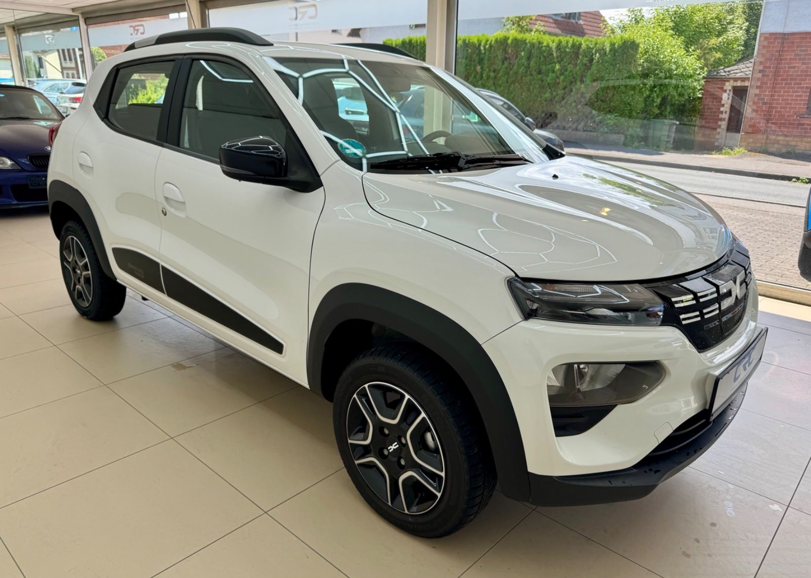 Fahrzeugabbildung Dacia Spring Electric Essential ab 99€ im Monat!*MwSt*