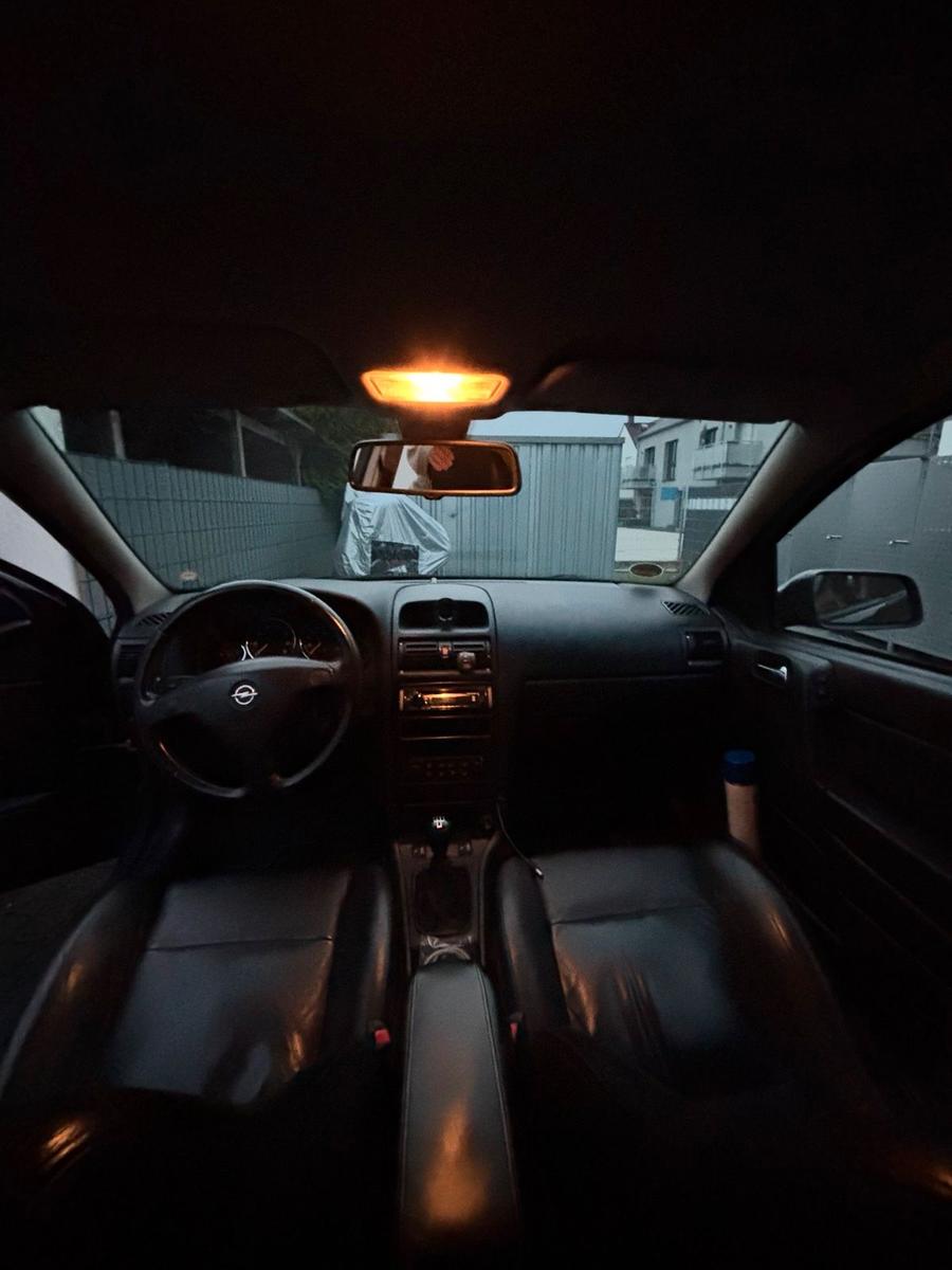 Opel Astra 2004 — photo 8