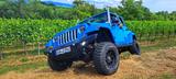 Jeep Wrangler 3.6l V6 JKU Sahara Aut.  Chiefblue - gebrauchte Jeep Wrangler aus dem Jahr 2019