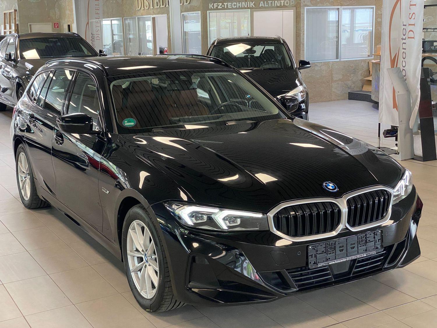 BMW 320 e LCI individual Leder Navi LED DAB H&K