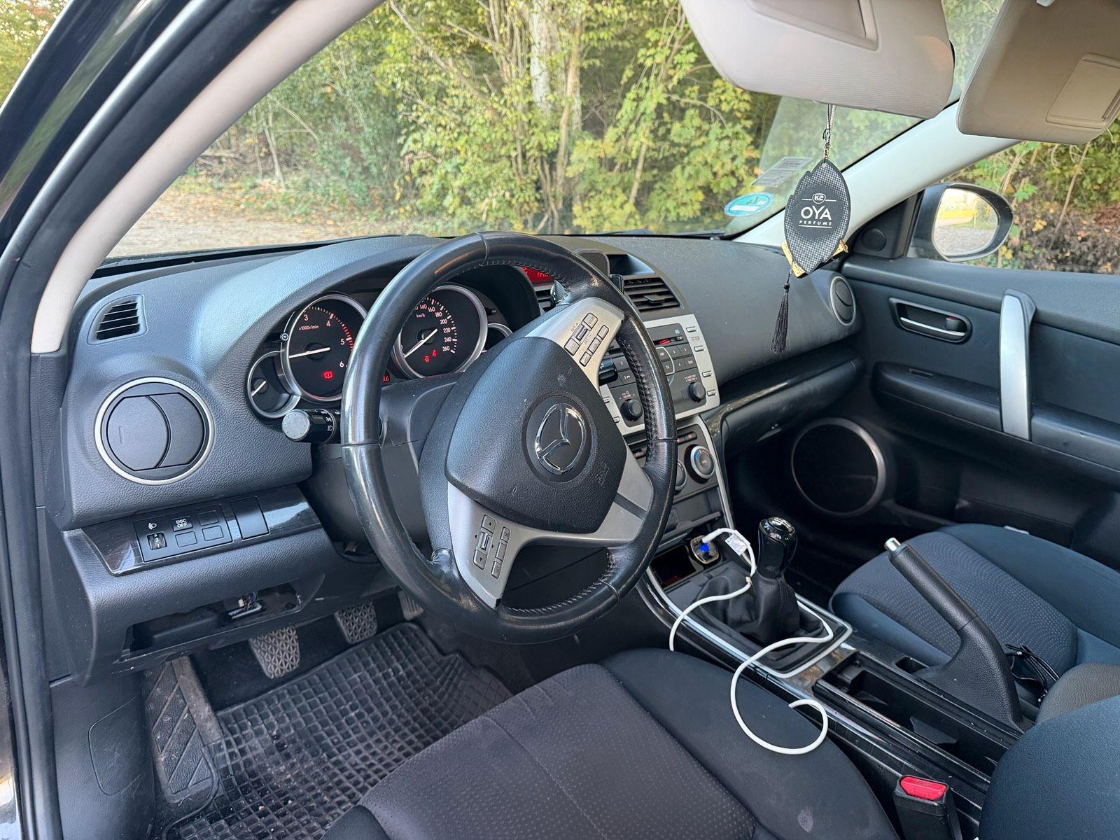 Mazda 2 2009 — photo 10