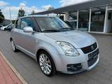Suzuki Swift Lim. Sport 1.6 16V Klima *HU Neu* - silberne Suzuki Swift