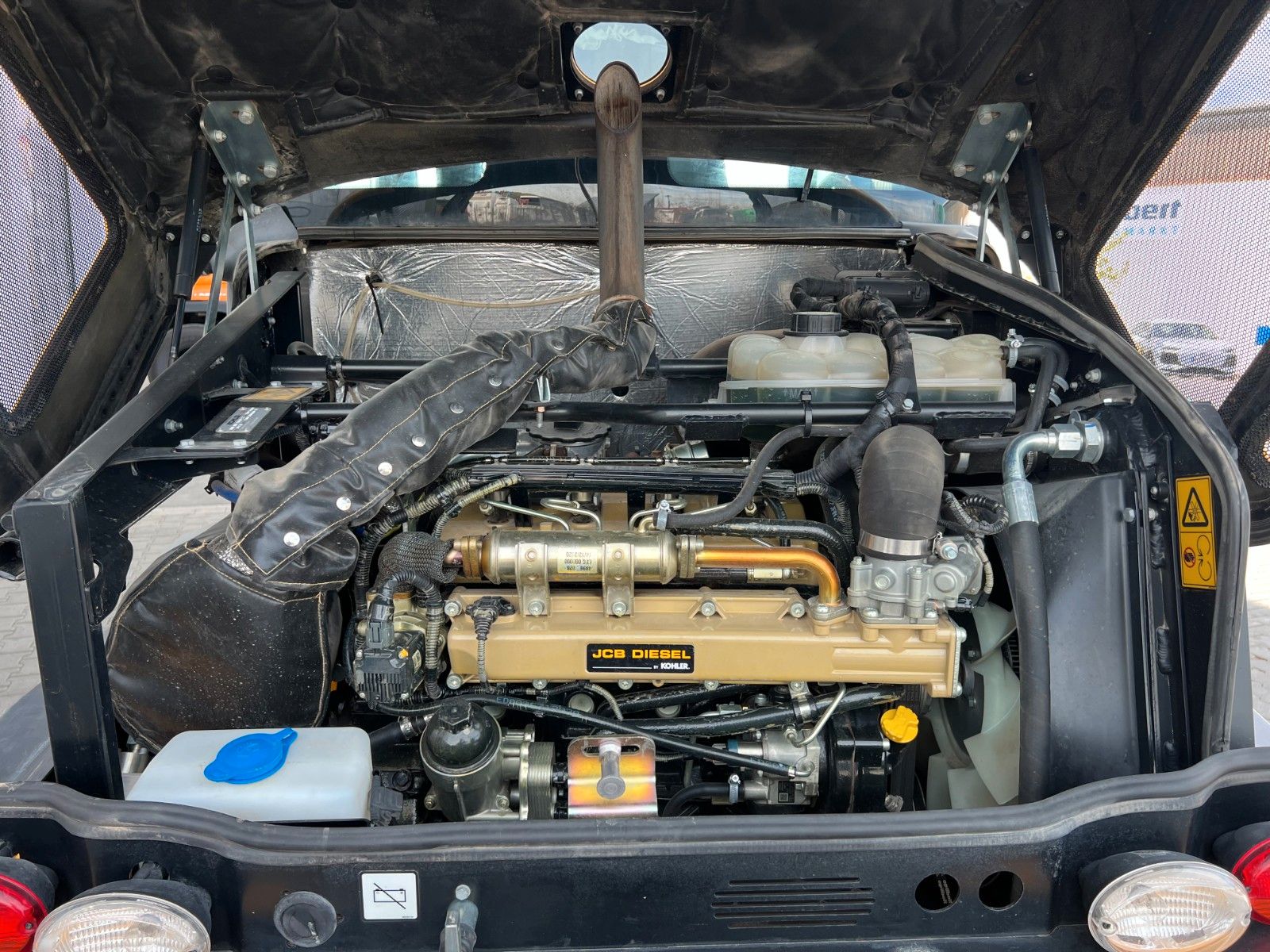 Fahrzeugabbildung JCB 409 SV / nur 2.496h / Klima Klappschaufel Gabel