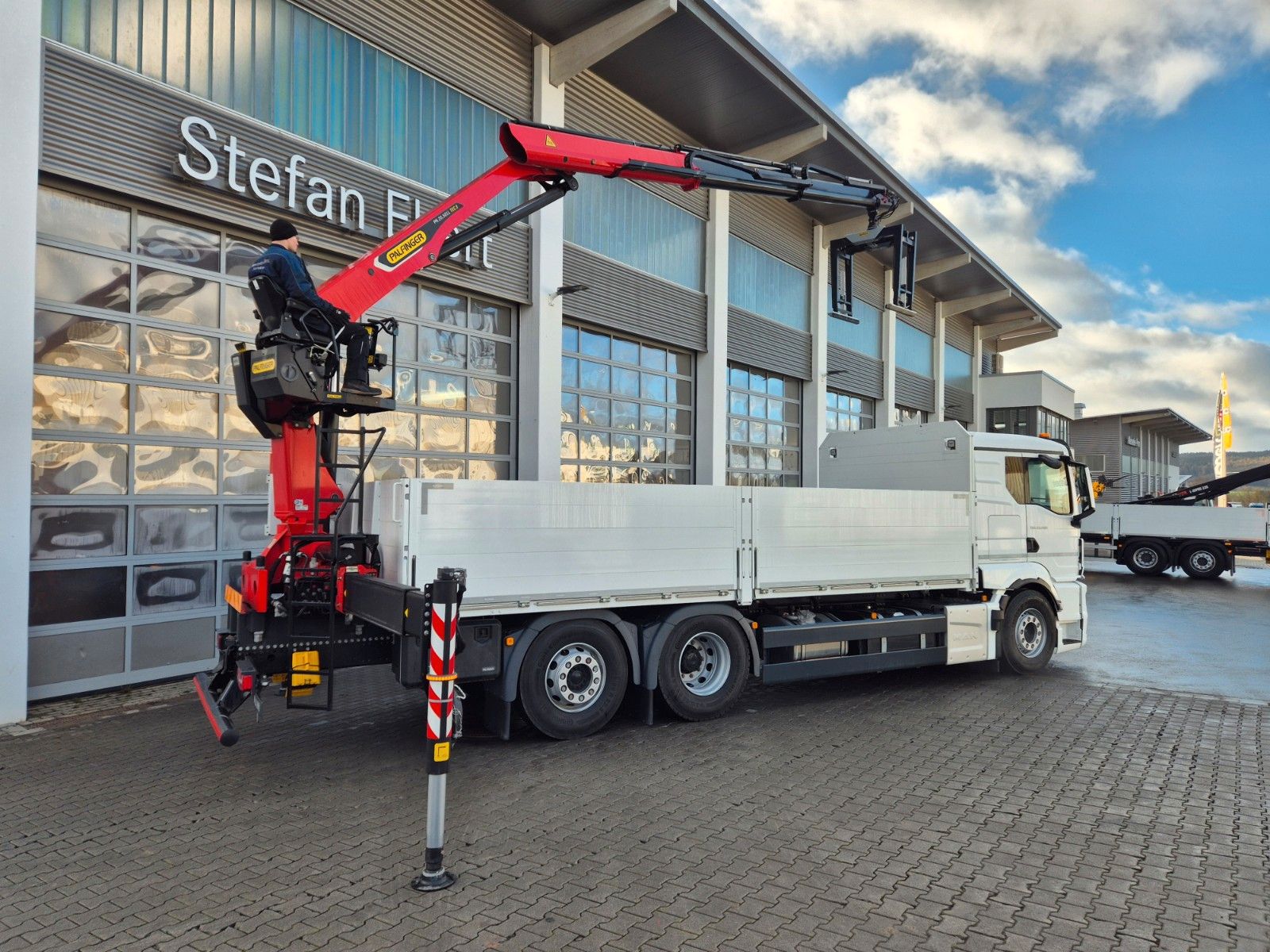 Fahrzeugabbildung MAN TGS 26.470 6x2-4 LL Baustoff Palfinger PK20.501L