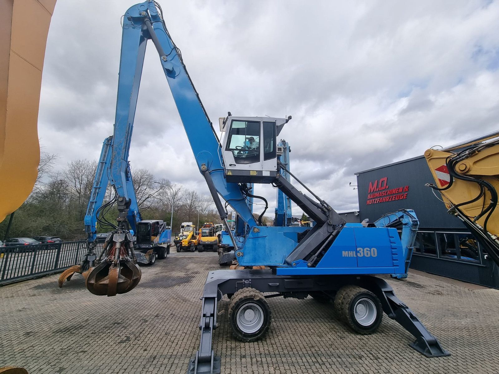 Fahrzeugabbildung Fuchs MHL 360 / AC / Magnetanlage /Polypgreifer /
