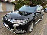 Mitsubishi Outlander 2.4 MIVEC PLUG-IN HYBRID 4WD Top Top - Mitsubishi Outlander in Gelsenkirchen
