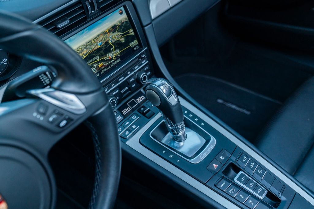 PORSCHE 991 Carrera 4 Cabriolet/ PASM / SPORT AGA / BOSE PORSCHE 991 Carrera 4 Cabriolet/ PASM / SPORT AGA / BOSE