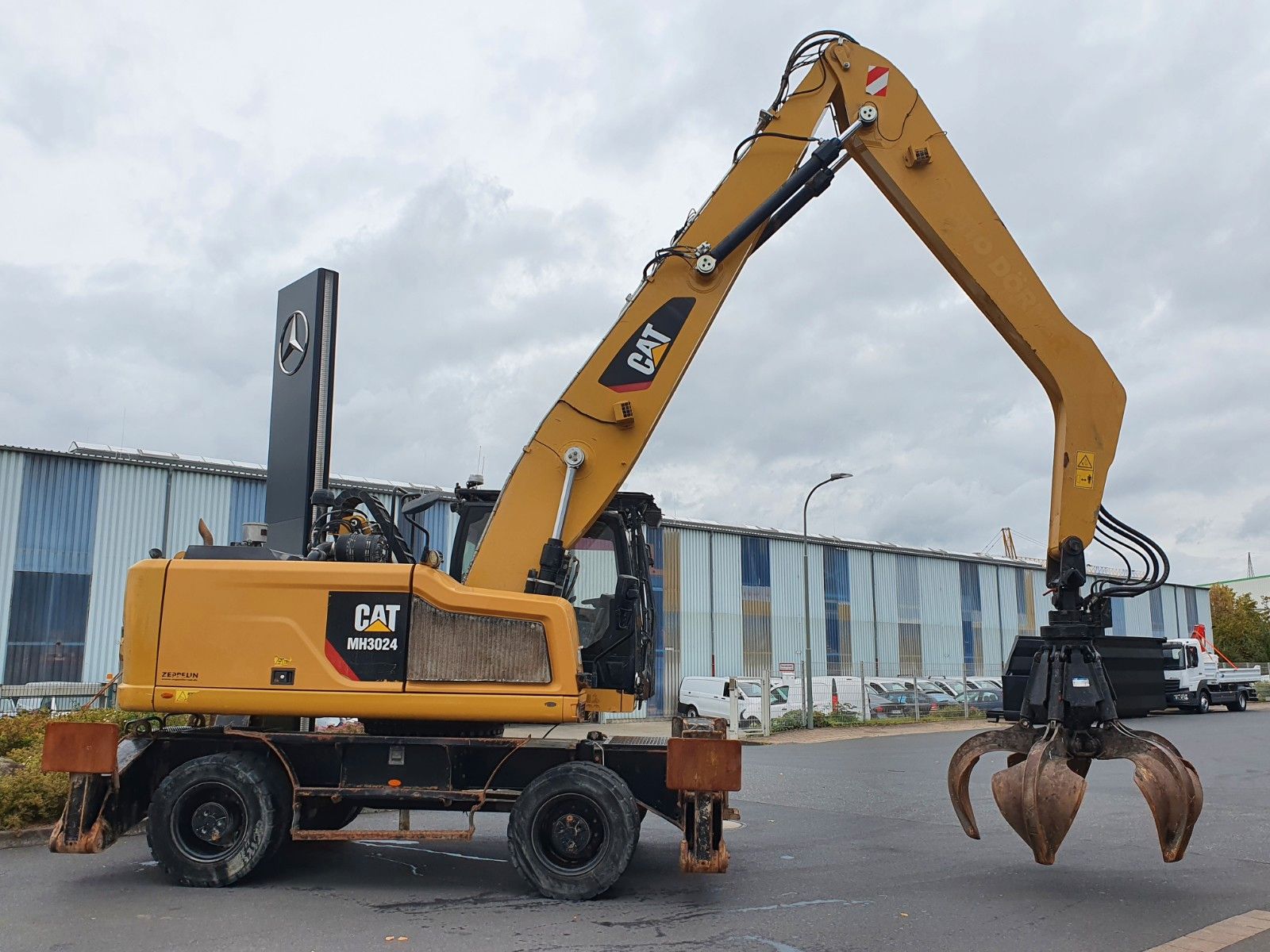Fahrzeugabbildung CAT MH3024 / MH 3024 / Greifer / 2018 / 9.424h