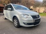 Volkswagen Touran Highline / DSG Automatik / Navi / PDC - gebrauchte VW Touran aus dem Jahr 2009