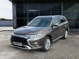 Mitsubishi Outlander 2.4 Plug-in Hybrid Plus 4WD Shzg. Lede - mit Hybrid-Antrieb: Braun, mit Klimaanlage