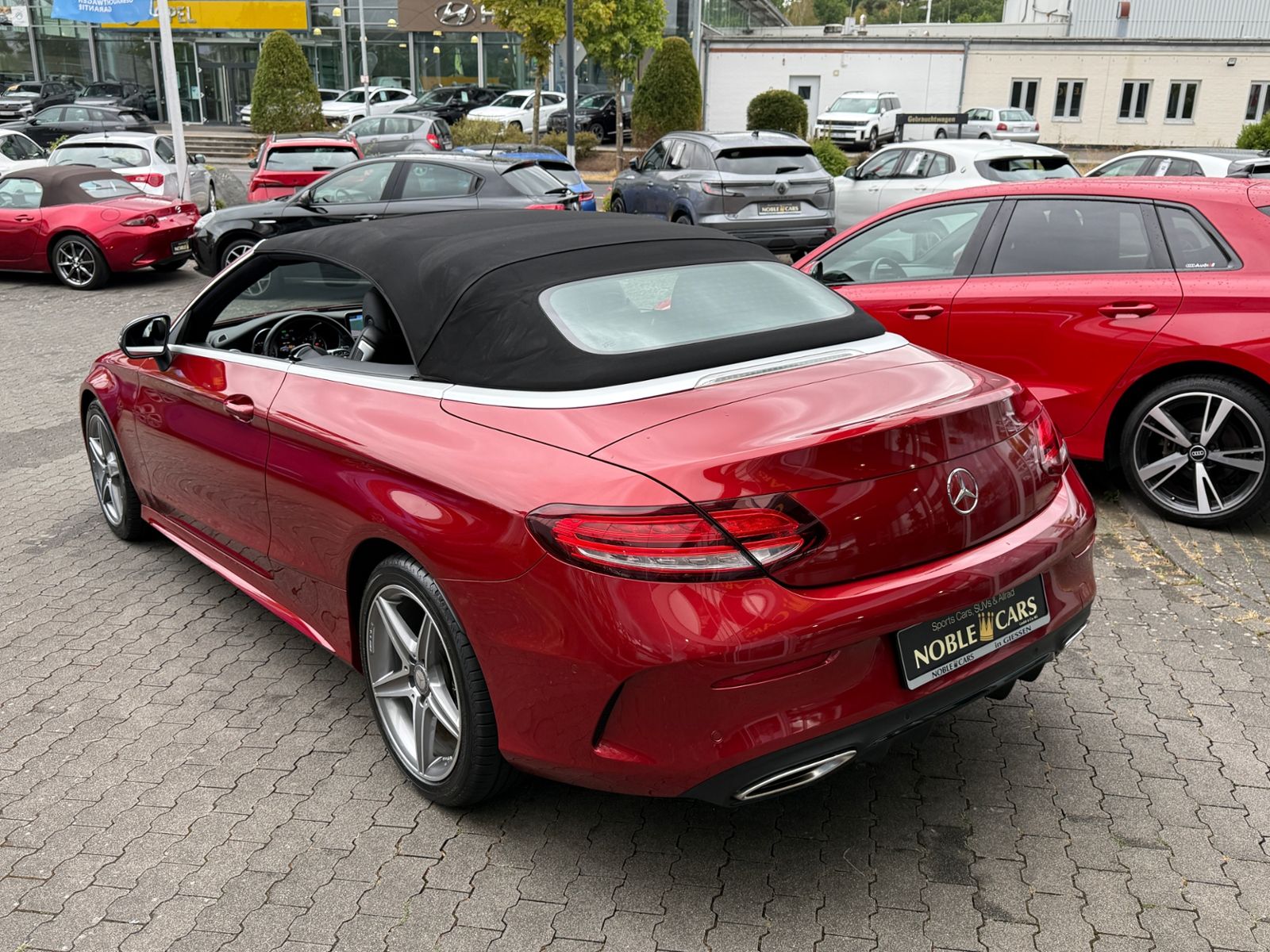 Fahrzeugabbildung Mercedes-Benz C 200 Cabrio AMG NIGHT Navi Rückfahr KAM Sounds.