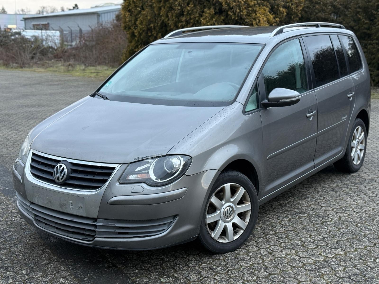 Volkswagen Touran Freestyle * 7 SITZE * NAVI * TURBO NEU *