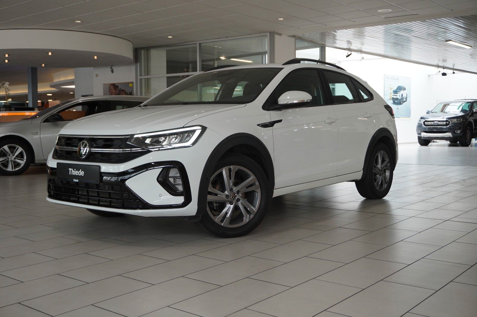 Fahrzeugabbildung Volkswagen Taigo 1.0 TSI R-LINE NAVI/LED/KAMERA/SPORT/DAB+