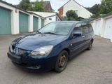 Mitsubishi Lancer 1.6 - Mitsubishi Lancer mit Benzin-Antrieb: Kombi, 1.6