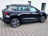Skoda Karoq 1.5l TSI DSG Sportline  AHK,19",Navi,5/100 - Skoda Karoq Tageszulassungen