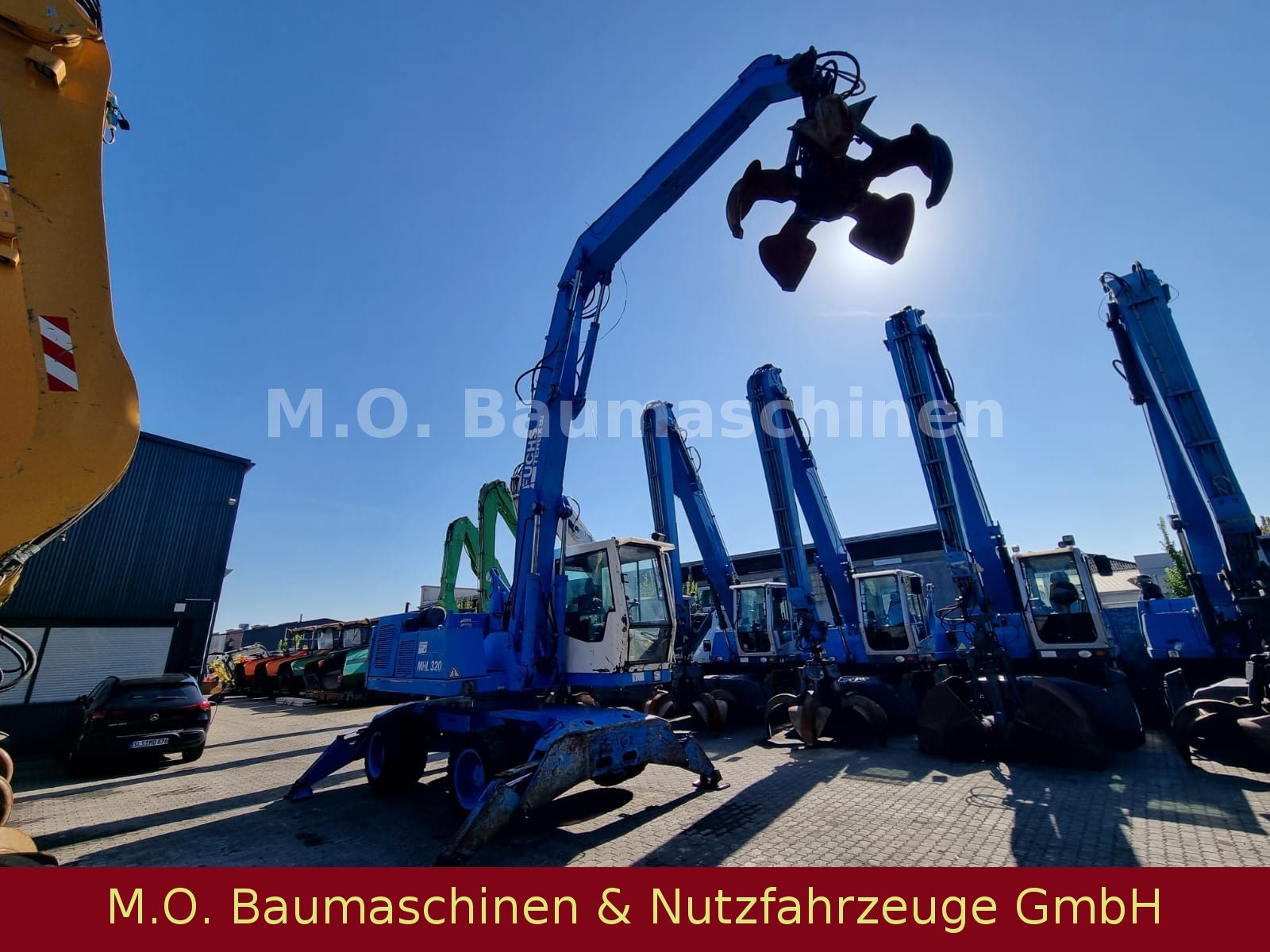 Fahrzeugabbildung Fuchs Terex MHL 320 / Polyp/ Liftkabine