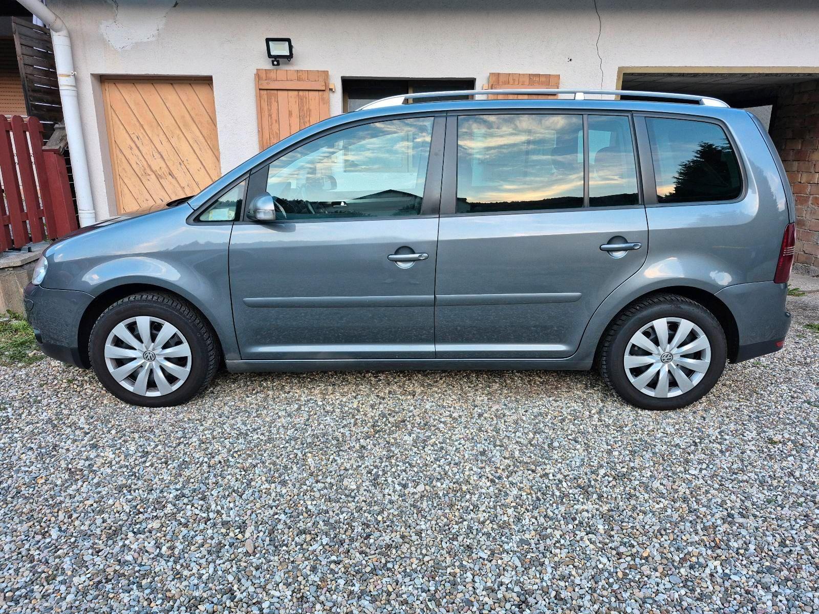 Volkswagen Touran 2004 — engine 140 HP (103kW)