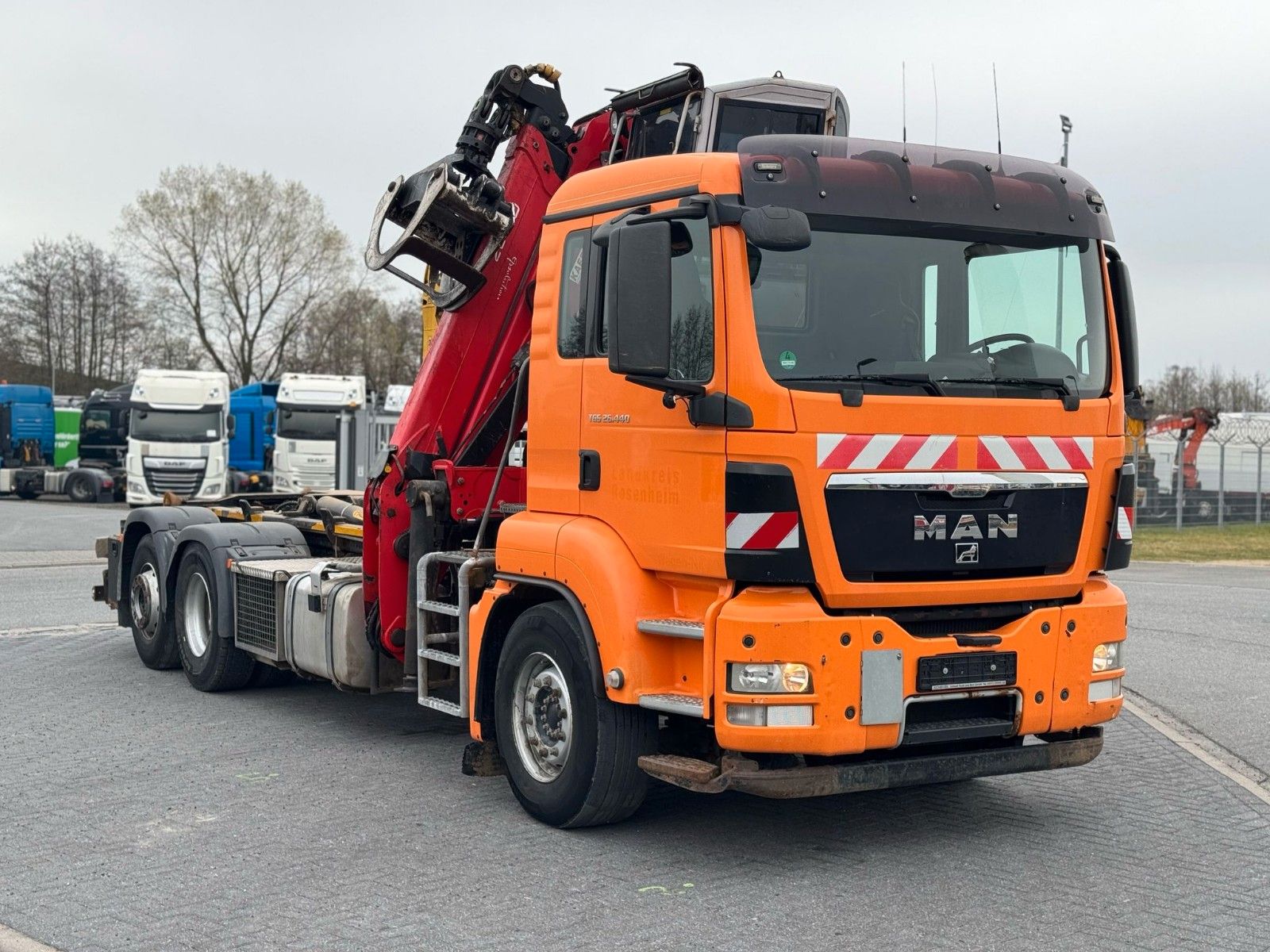 Fahrzeugabbildung MAN TGS 26.440 6x2-4 BL Abrollkipper / Kran