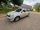 Opel Astra H Caravan Edition|8-fach bereift - Opel Astra mit Benzin-Antrieb: Kombi, Caravan F