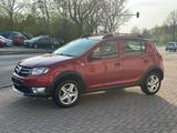 Dacia Sandero II Stepway Prestige NAVI/PDC/AHK/2HAND - Dacia Gebrauchtwagen von 2013