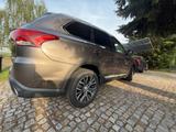 Mitsubishi Outlander 2.0 MIVEC Plus ClearTec 4WD CVT Plus - Mitsubishi Outlander: 2.4