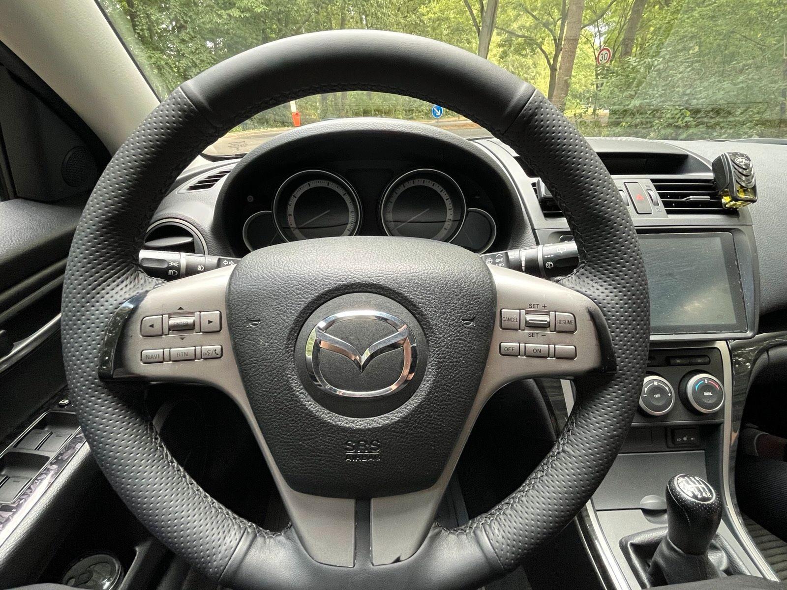 Mazda 2 2008 — photo 11