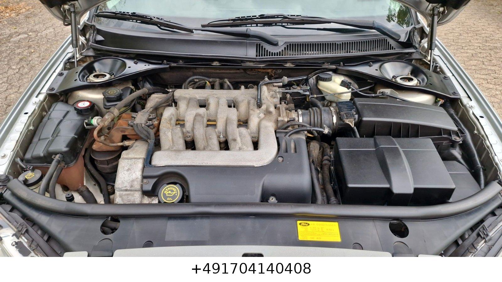 Ford Mondeo 2004 — photo 20