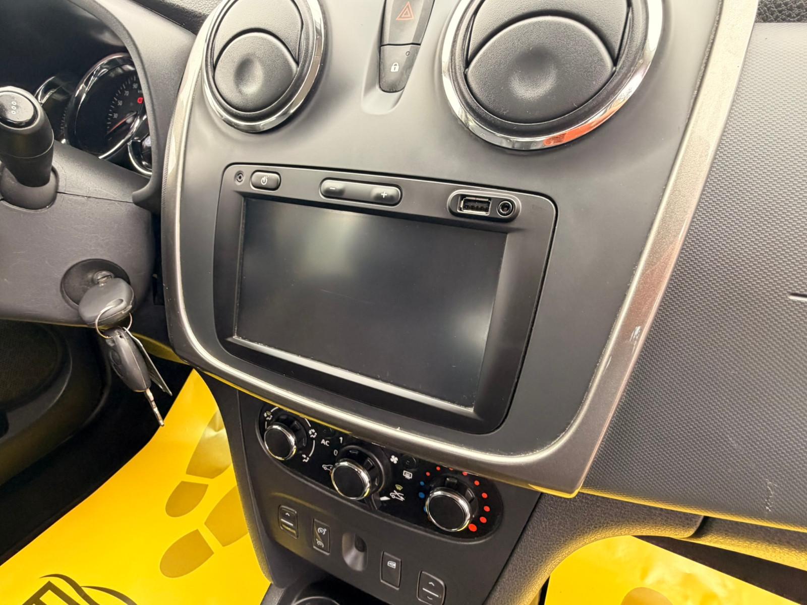 Dacia Logan 2014 — photo 16