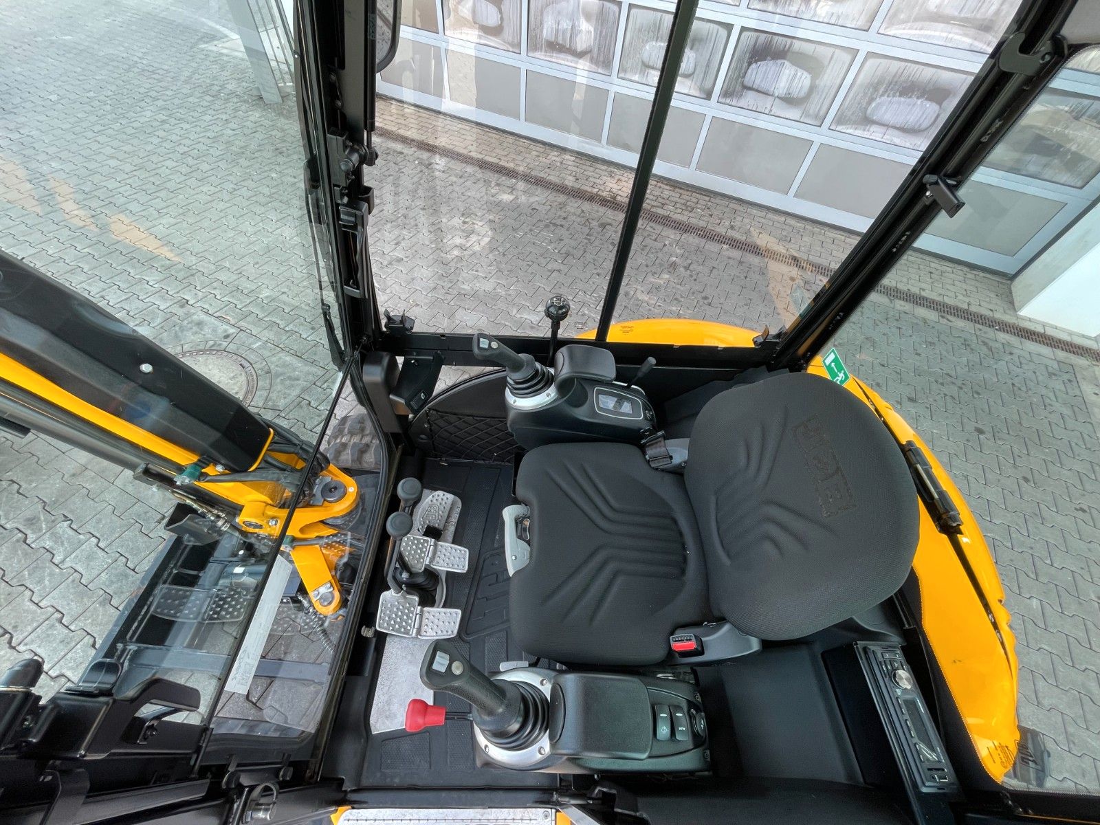 Fahrzeugabbildung JCB 8029 CT / 151h / 2023 / Inkl. Löffelpaket - mit KI generiert/bearbeitet